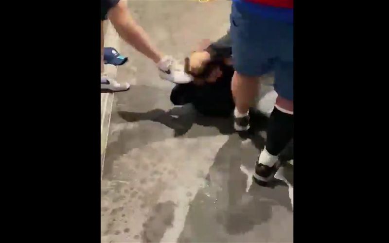 Image for Video: English kick and bash Asian man on the ground in Wembley shame