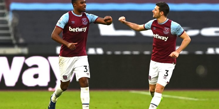 Ben-Johnson-and-Aaron-Cresswell-celebrate-scoring-for-West-Ham